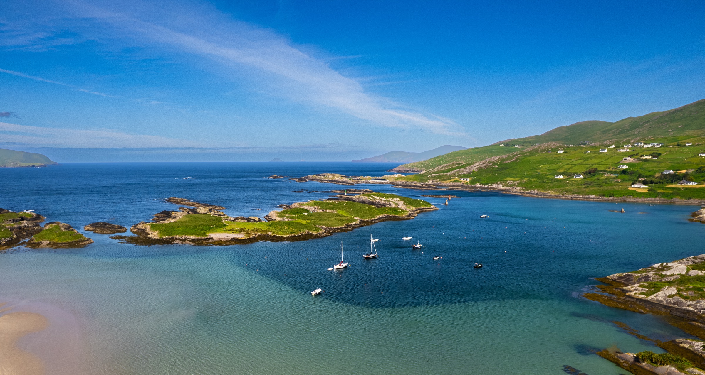 Aerial photograph of the rugged South Kerry coast and Derrynane Coast Hotel on the Wild Atlantic Way