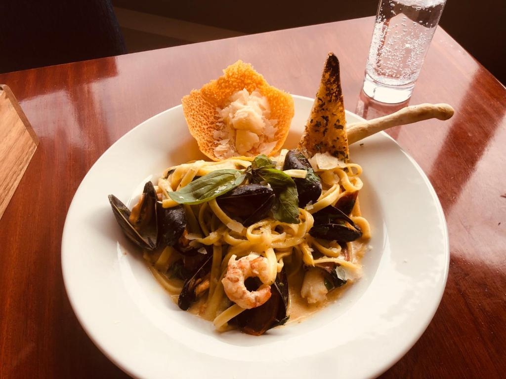 Linguine with locally-caught mussels, prawns and parmesan tuile served at the Derrynane Coast Hotel restaurant.