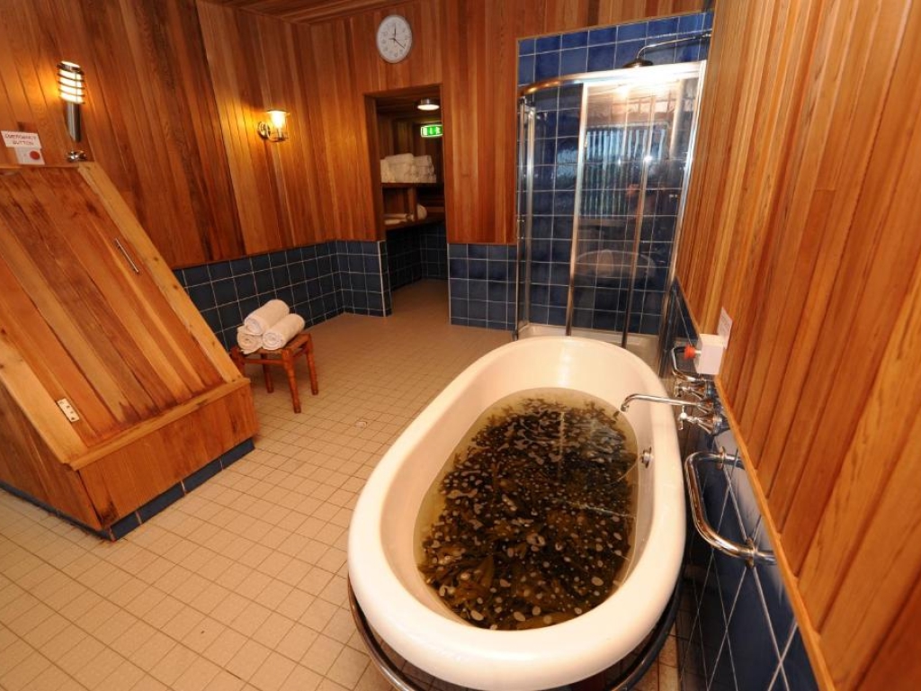 Traditional Atlantic seaweed bath drawn for a guest at the Derrynane Coast Hotel spa.
