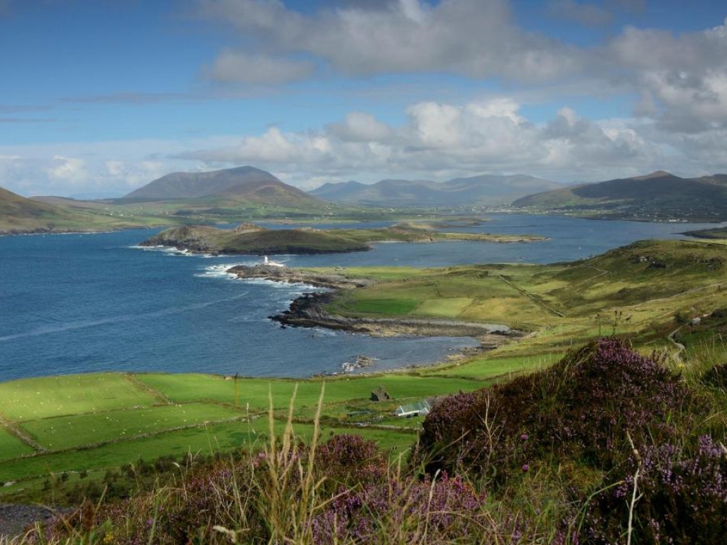 Cromwell Point lighthouse on Valentia Island viewed from a Ring of Kerry hillside near Derrynane.